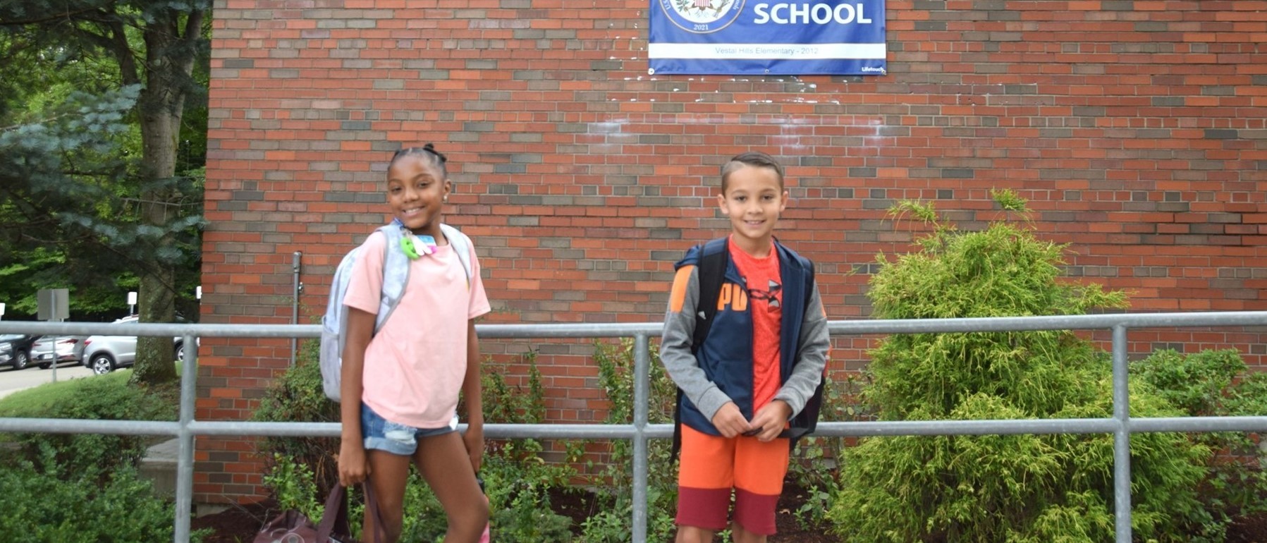 Vestal Hills Elementary fifth-graders head up to school on the first day of classes, September 8, 2022.